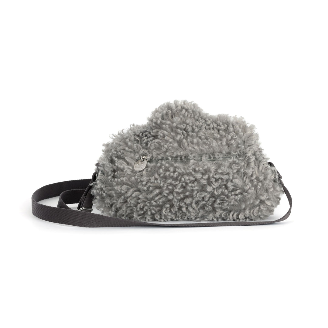 gray storm cloud plush shoulder bag with curly textured fur, adjustable strap, on a white background