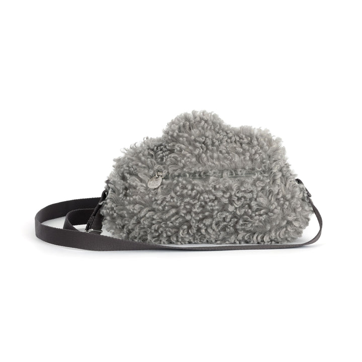gray storm cloud plush shoulder bag with curly textured fur, adjustable strap, on a white background
