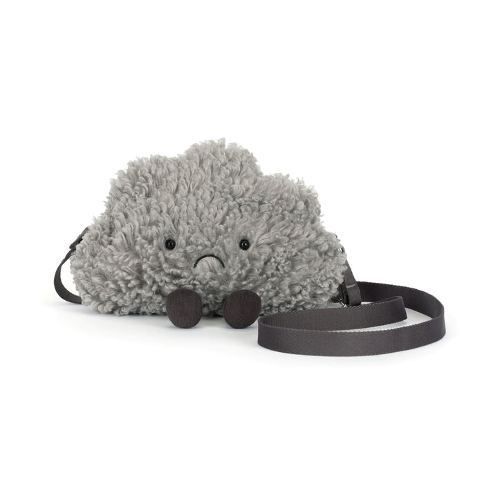 gray storm cloud plush shoulder bag with curly textured fur, adjustable strap, corduroy feet, and a playful grumpy face on a white background