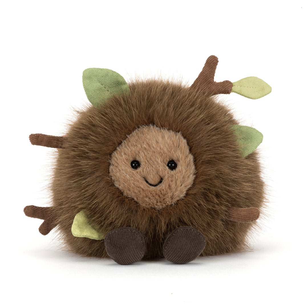 Amuseables Mulshi Woodland Floor Jellycat plush with fluffy brown fur, embroidered leaves and twigs, smiling face, and corduroy feet on a white background.