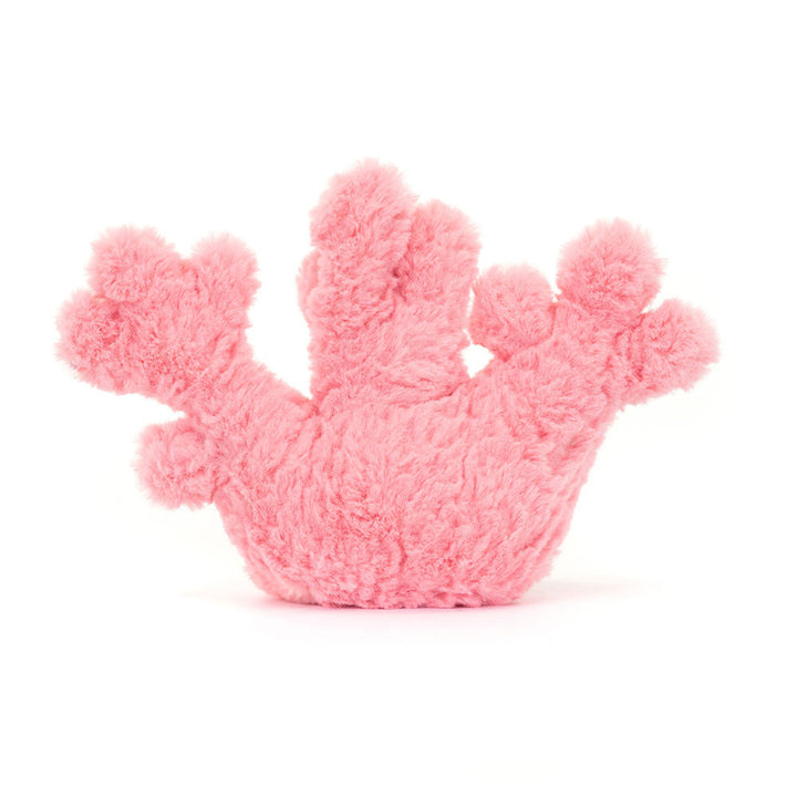 Back view of the Jellycat Amuseable Coral plush toy, showcasing its various soft, textured pink 'branches' or polyps from behind, on a clean white background.