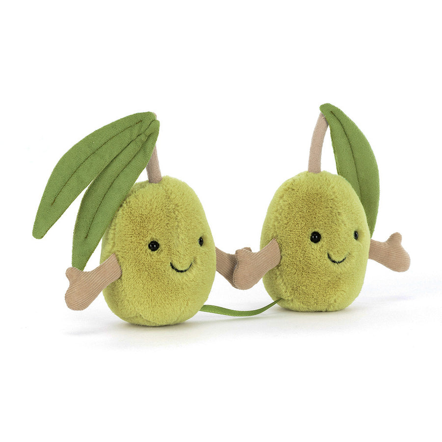 Two smiling plush olives connected by ribbon and velcro hands with soft green leaves