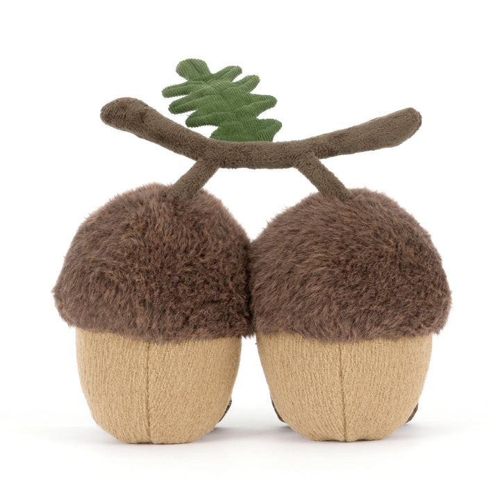 Jellycat Amuseables Ort & Tum Acorns plush featuring two acorns connected by a soft oak branch with green leaves.