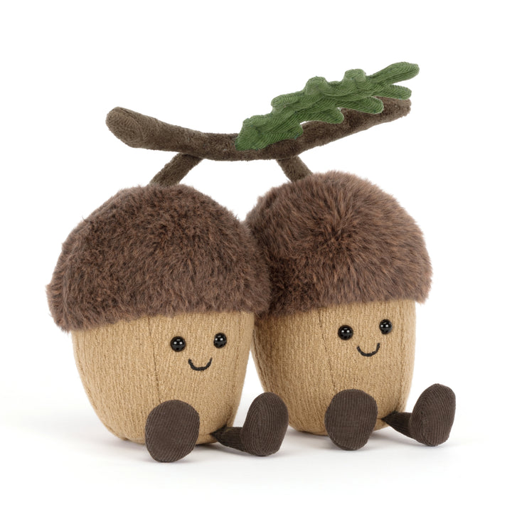 Jellycat Amuseables Ort & Tum Acorns plush featuring two smiling acorns connected by a soft oak branch with green leaves.