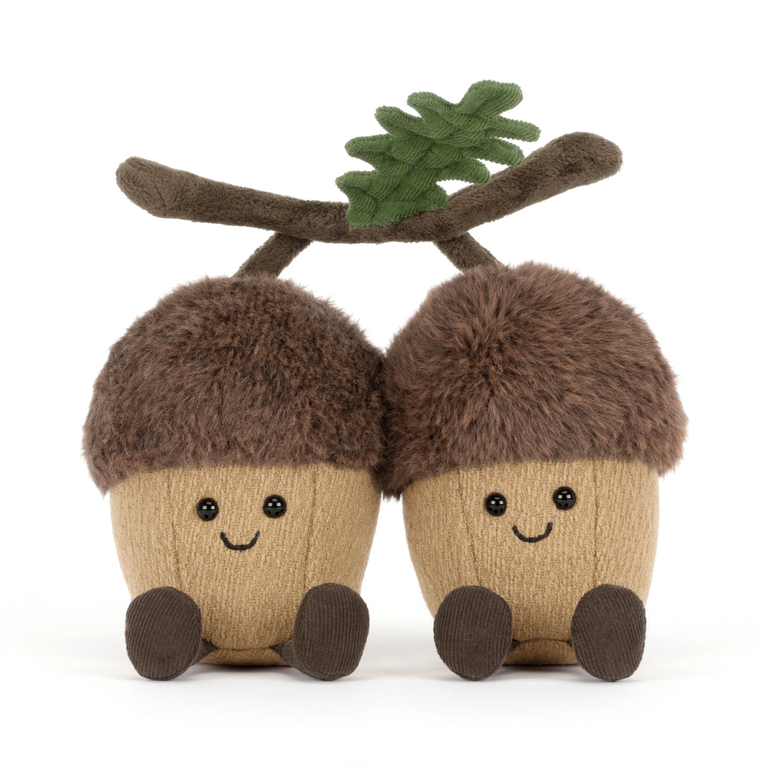 Jellycat Amuseables Ort & Tum Acorns plush featuring two smiling acorns connected by a soft oak branch with green leaves.