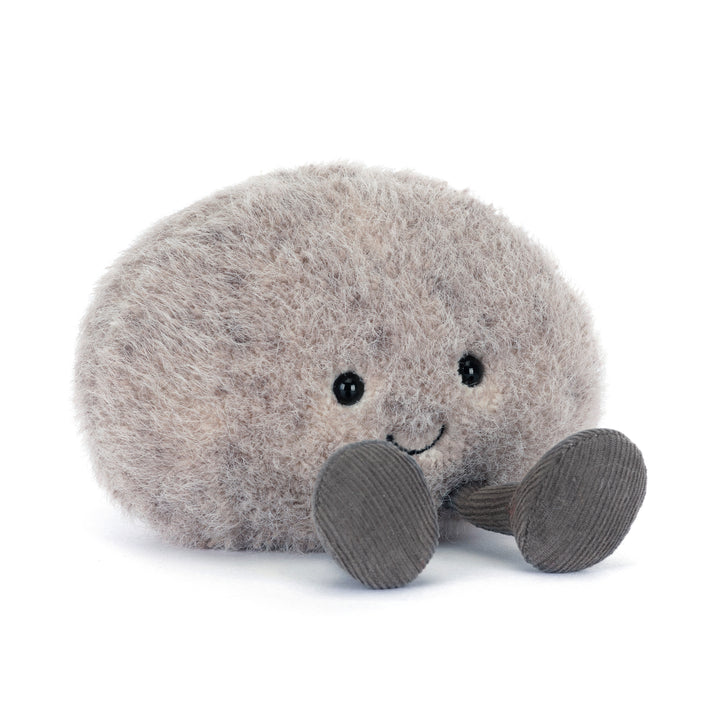 amuseables pebble plush in soft grey tones with smiling face and cord legs