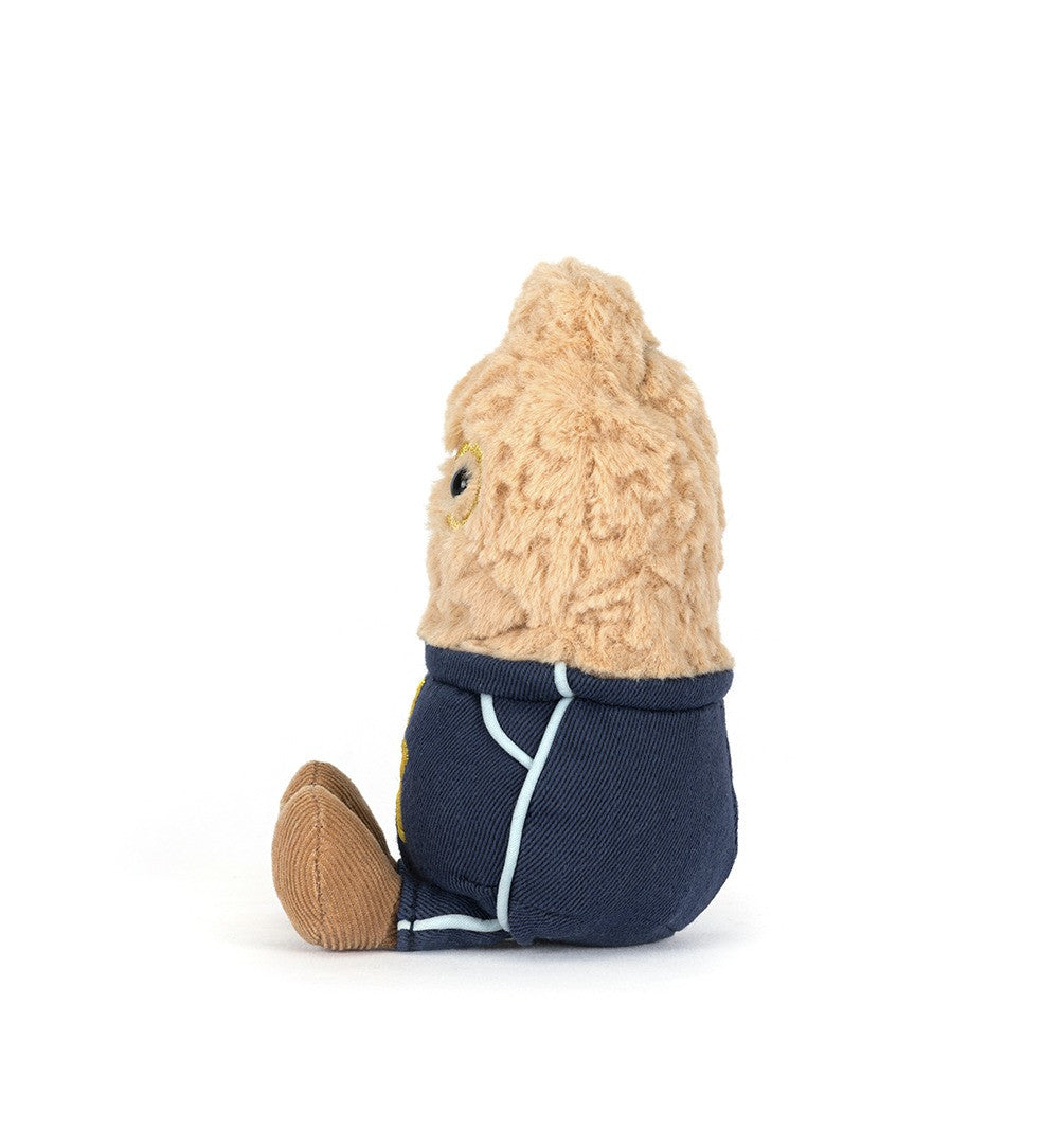 Smiling plush peanut wearing glasses and a star student outfit. side profile left