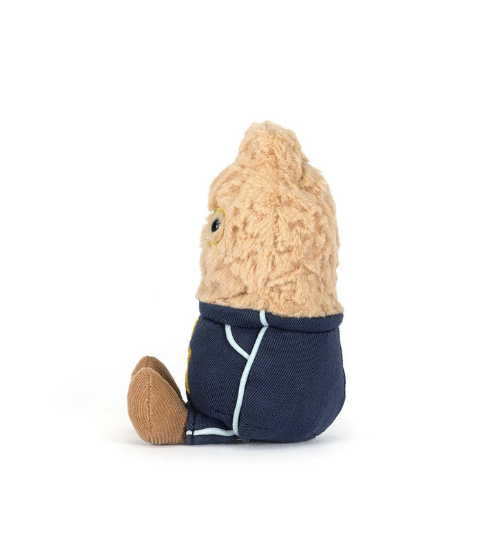 Smiling plush peanut wearing glasses and a star student outfit. side profile left