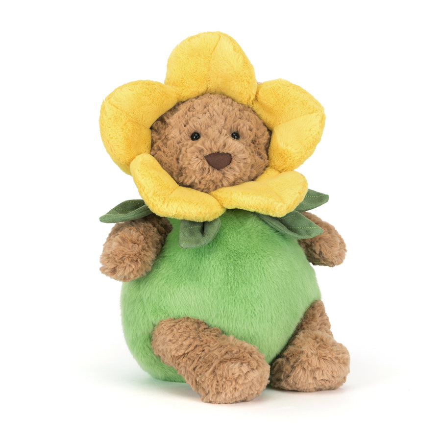 brown teddy bear plush wearing yellow daffodil flower costume