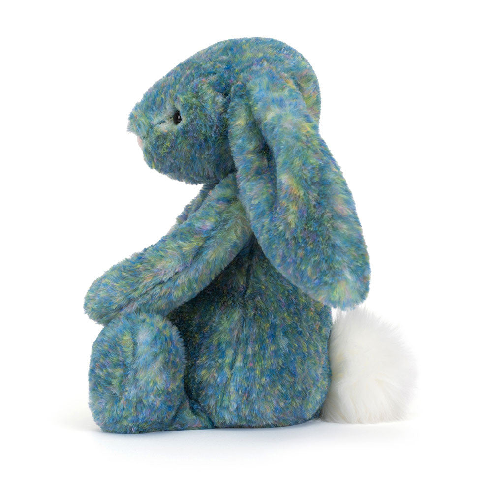 Bashful Luxe Bunny Azure side view showing off her ear & fluffy tail.