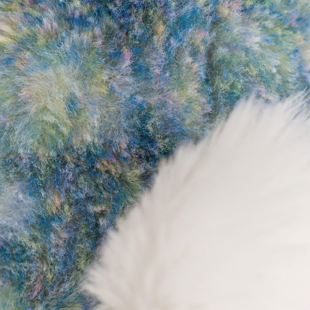 Bashful Luxe Bunny Azure back detail shot of her fluffy cream tail and luxe green, blue & pink fur.