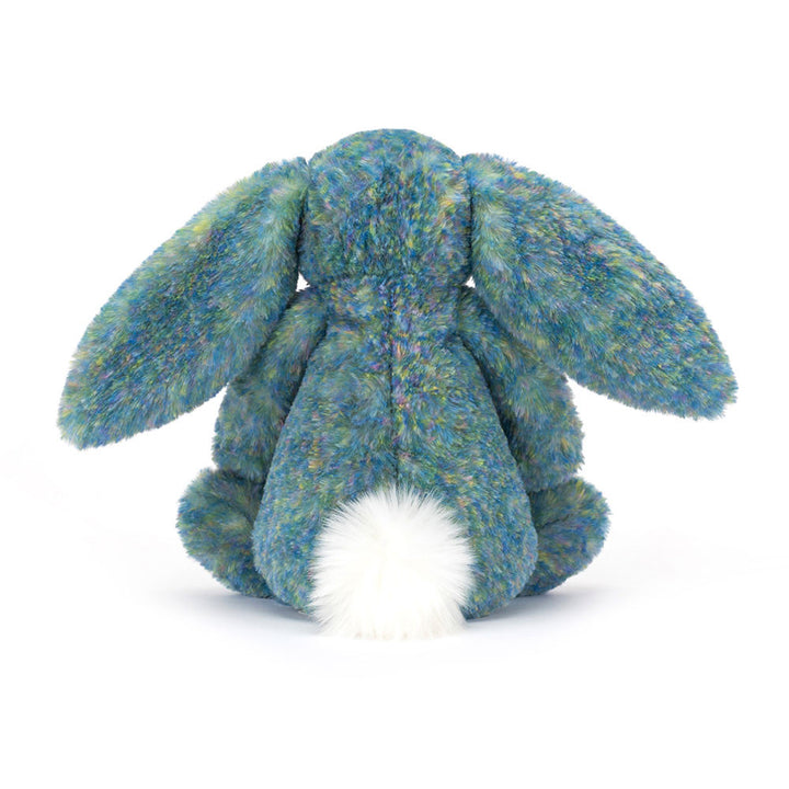 Bashful Luxe Bunny Azure back view showing off her beautiful green, blue & pink fur, fluffy cream tail and floppy ears .