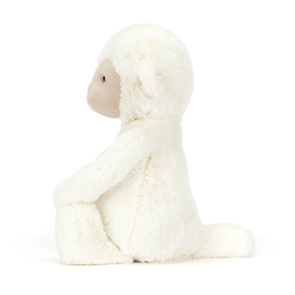 soft white lamb plush sitting upright with floppy legs