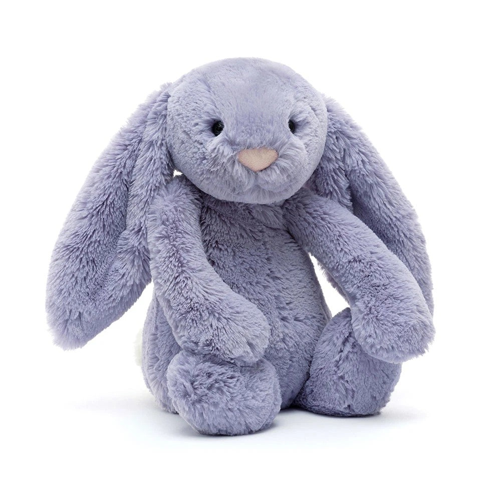 soft lavender bunny plush with floppy ears, pink nose, and cuddly fur sitting upright on a white background