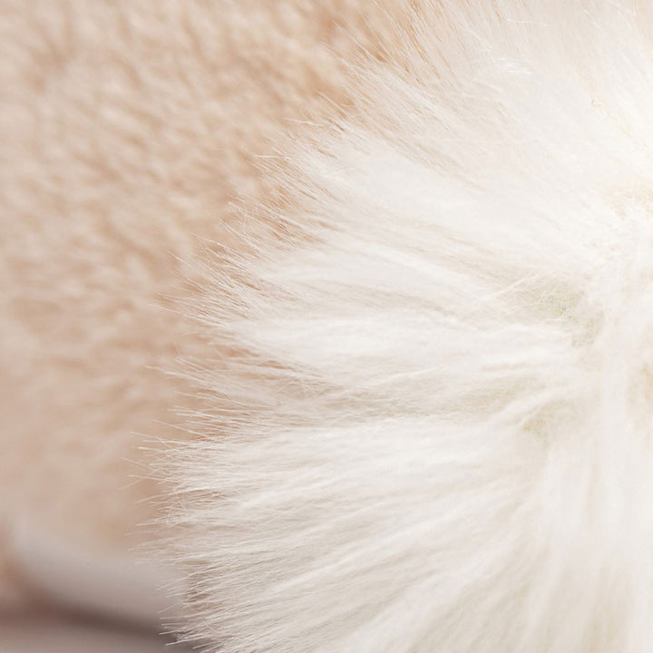 Jellycat Bashful Luxe Bunny Willow close-up showing golden beige plush fur and fluffy white tail 