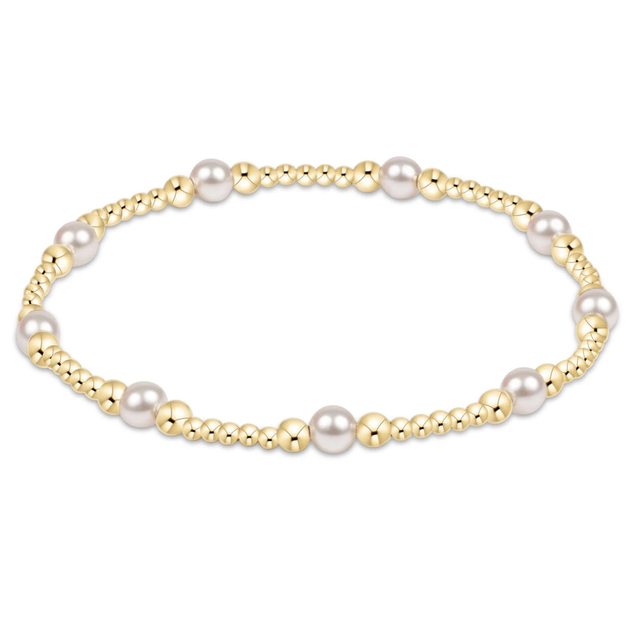 eNewton Purpose Pearl 4mm Gold Bracelet with white crystal pearls and 14kt gold-filled beads in a delicate patterned design