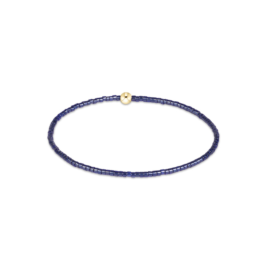 eNewton Hope Classic Bracelet in Navy featuring deep blue 2mm seed beads and a single polished 4mm 14kt gold-filled accent bead