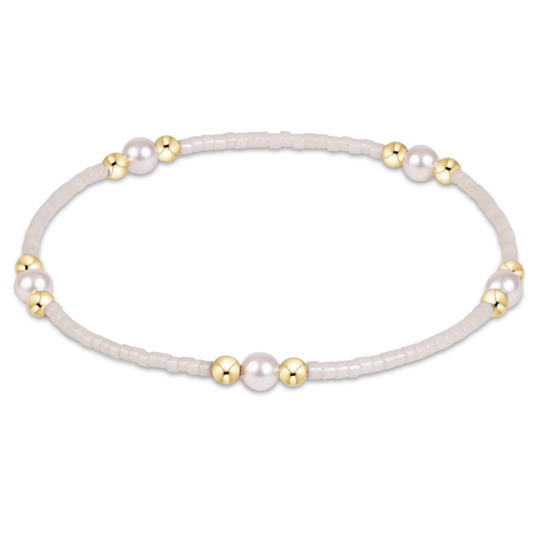 eNewton Hope Purpose Pearl Bracelet in Milkshake with creamy white seed beads, crystal pearls, and polished 14kt gold-filled beads