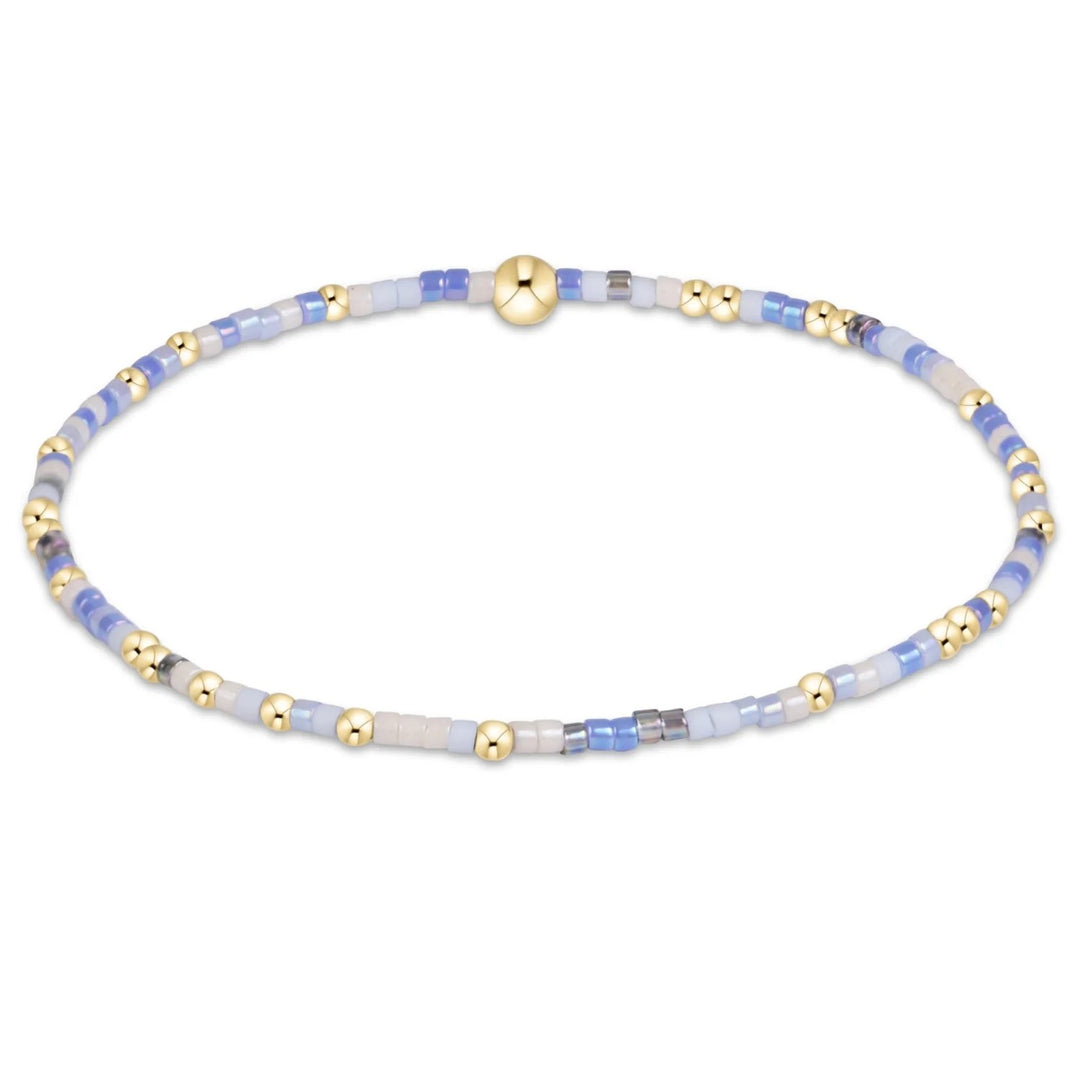 eNewton Hope Unwritten Bracelet in Bloopers with pastel blue, lavender, white, and iridescent seed beads accented by 14kt gold-filled beads