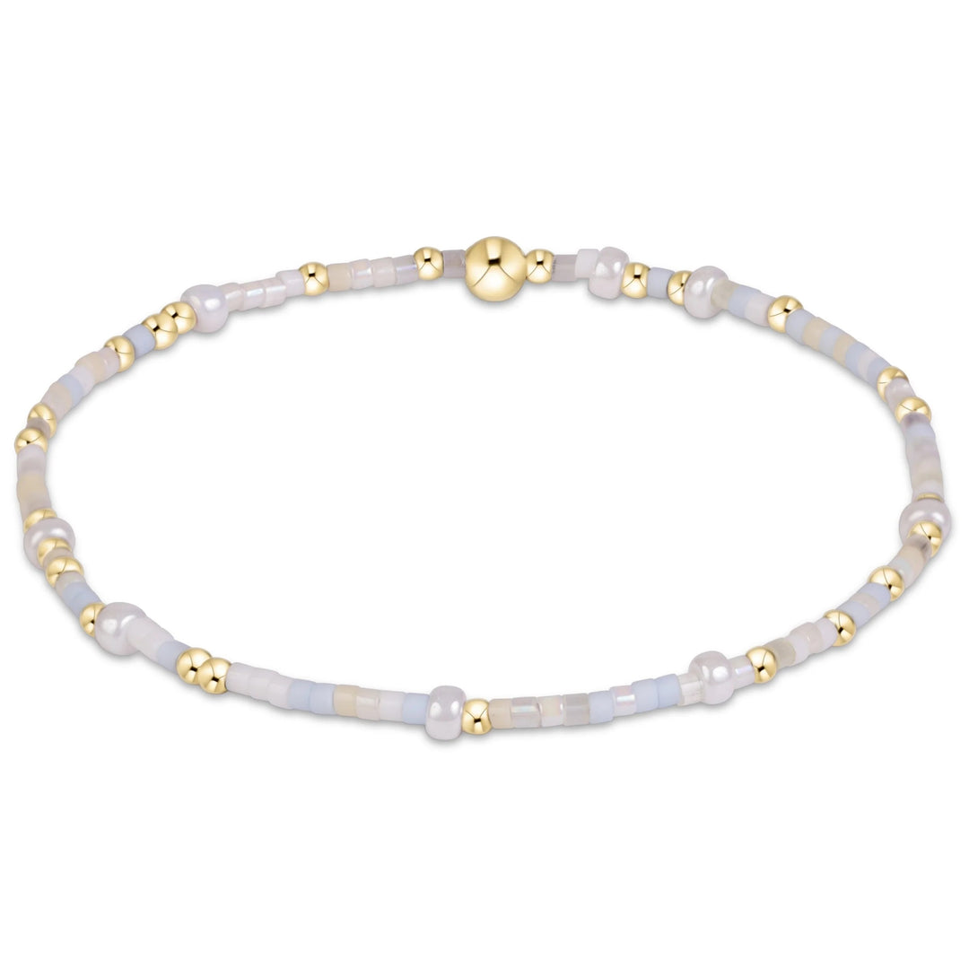 eNewton Hope Unwritten Bracelet in Daydreaming with pale blue, lavender, and milky white seed beads accented by 14kt gold-filled beads