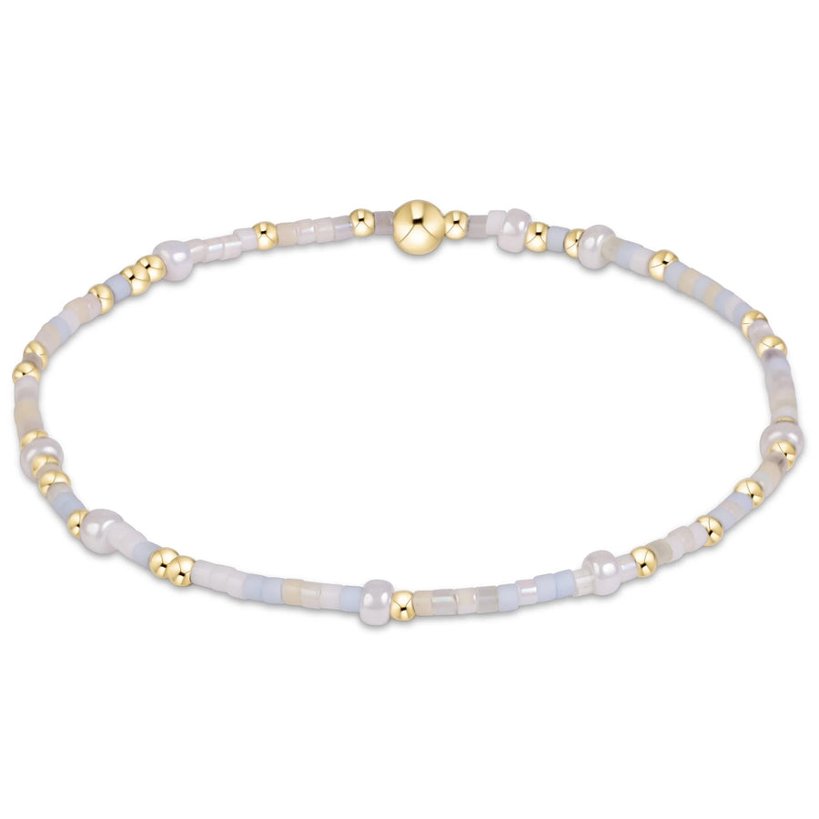 eNewton Hope Unwritten Bracelet in Daydreaming with pale blue, lavender, and milky white seed beads accented by 14kt gold-filled beads