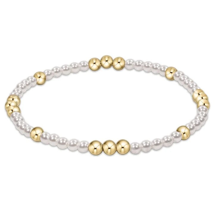 eNewton Worthy Pearl 3mm Bracelet featuring white crystal pearls and polished 4mm gold-filled beads in a delicate stretch bracelet design