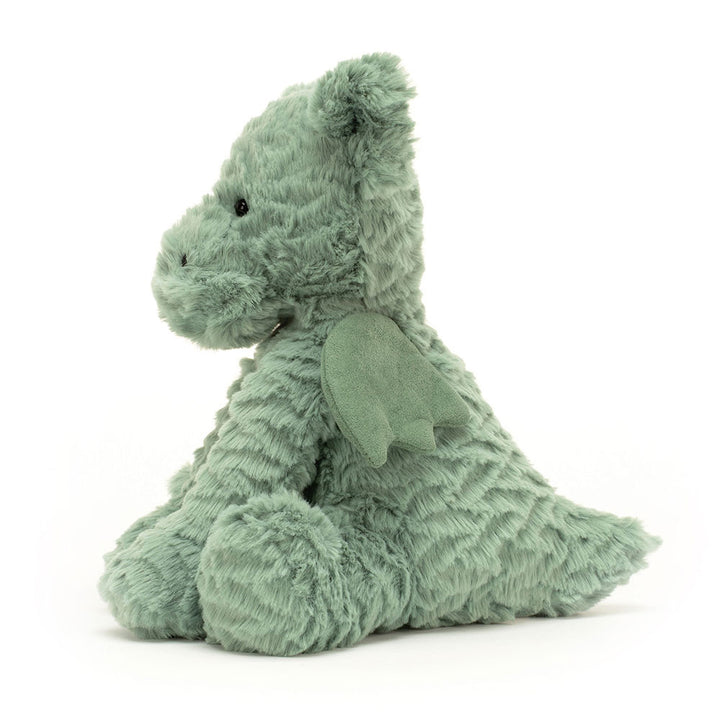 Sage-green Jellycat Fuddlewuddle Dragon plush with soft textured fur and little wings.