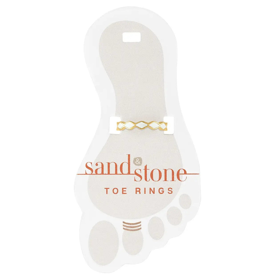 Gold infinity toe ring with white CZ accents on display card