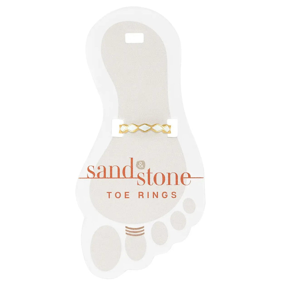 Gold infinity toe ring with white CZ accents on display card