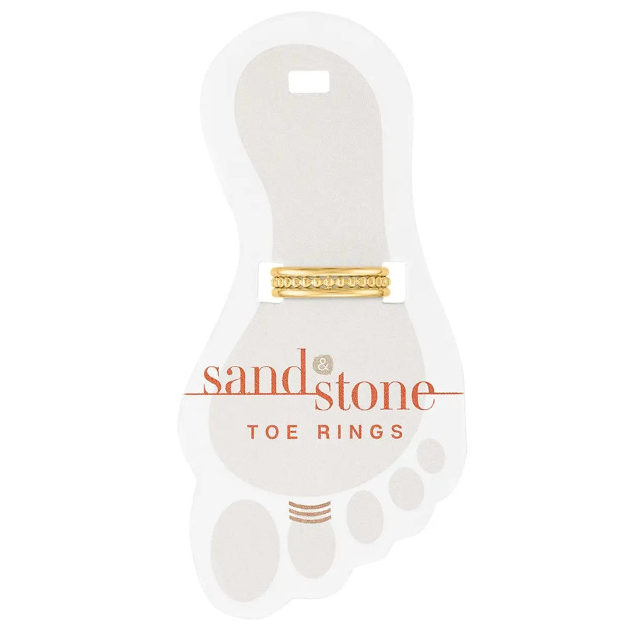 Gold triple layer toe ring with stacked band design on display card