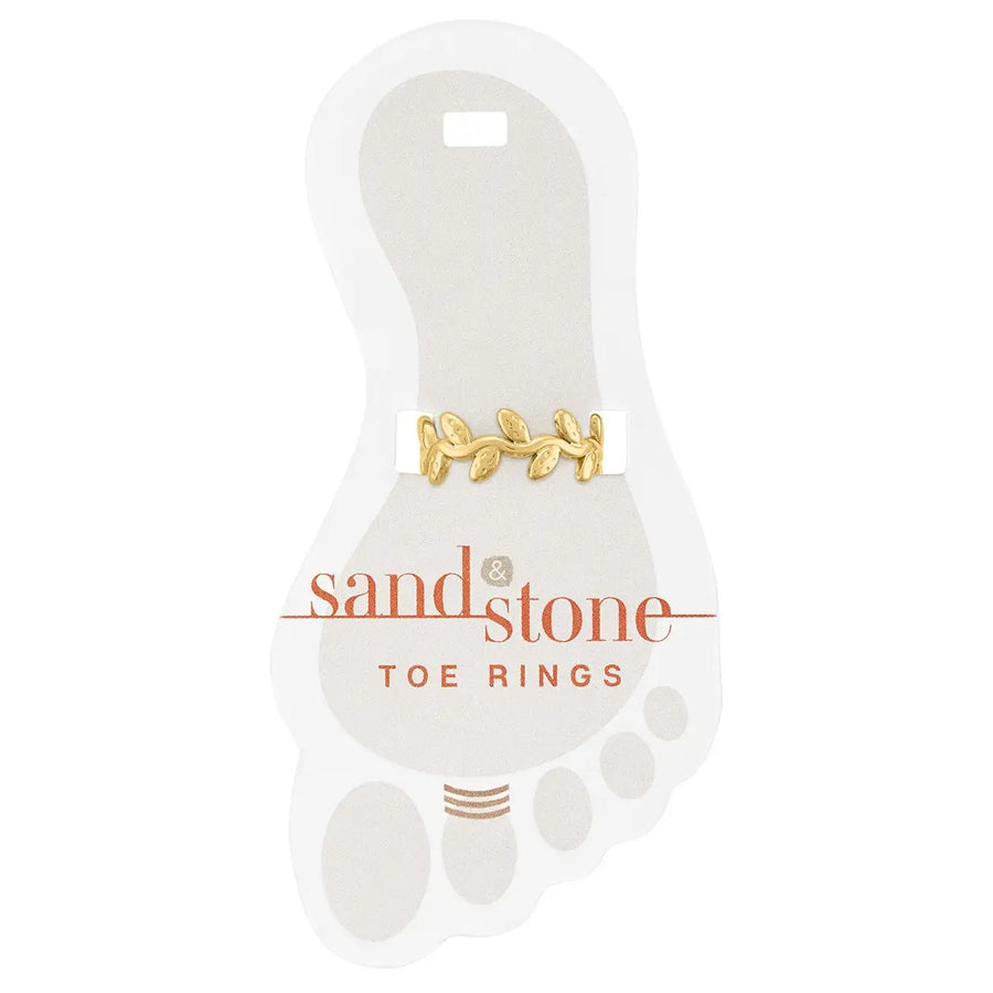 Gold toe ring with vine and leaf design on display card