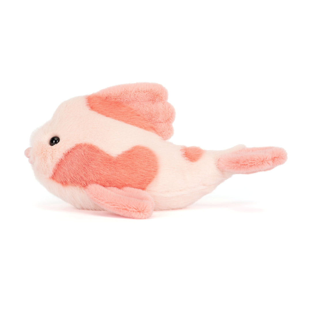 Plush toy fish with a pink/coral pattern on a white background
