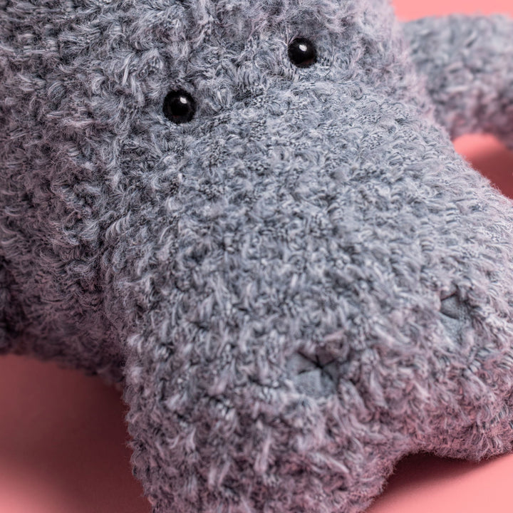 Closup of plus manatee on pink background