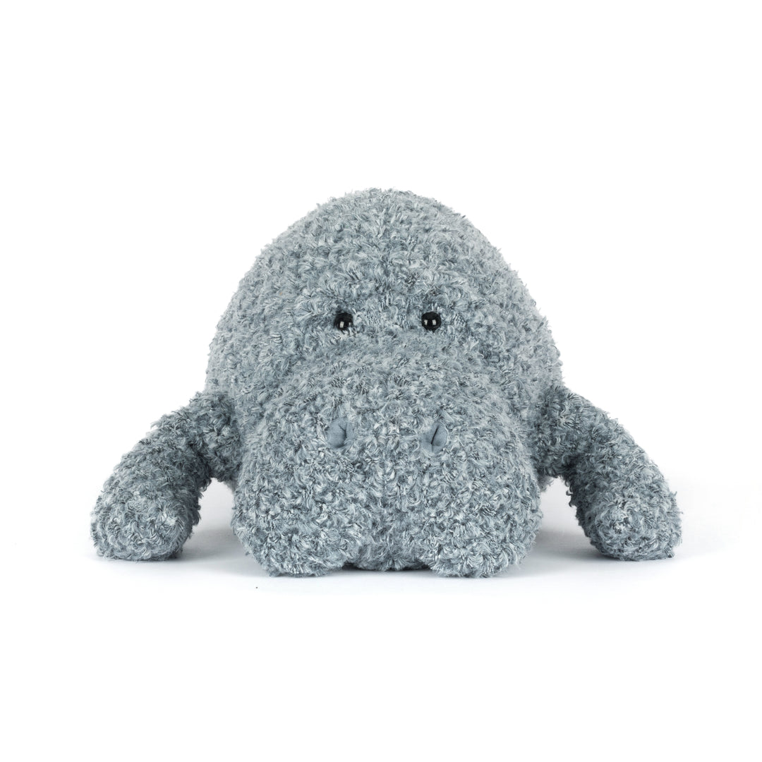 Plush toy manatee with a textured gray pattern on a white background