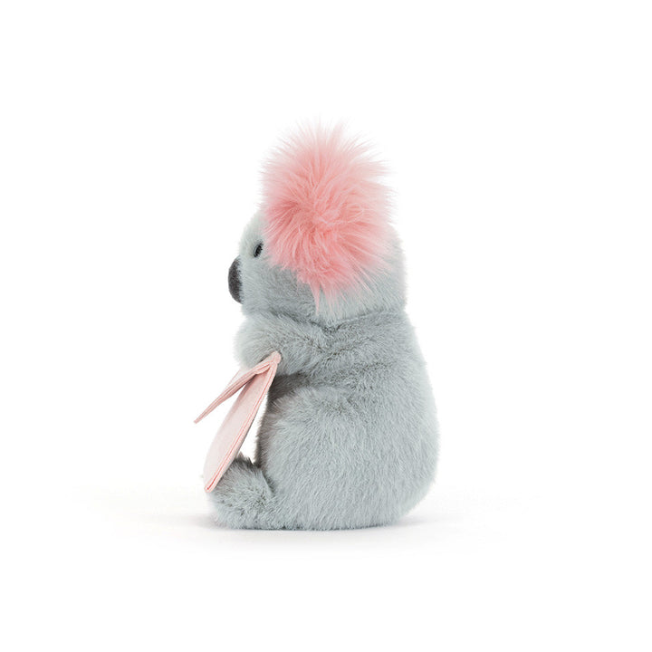 Jellycat Koala plush with fluffy pink ears holding a soft pink message envelope on a white background