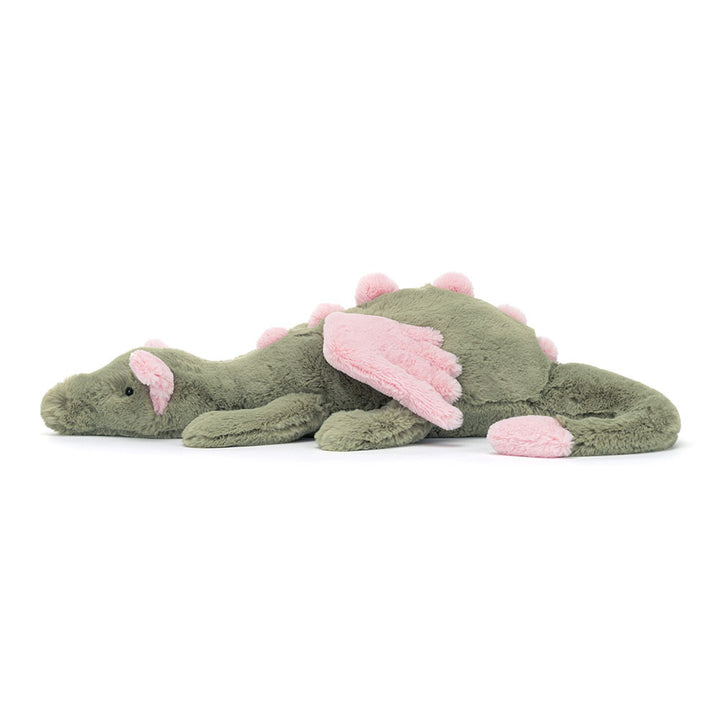 Jellycat Malachy Dragon plush with soft green fur, pink wings, and relaxed cuddly side left facing pose on a white background
