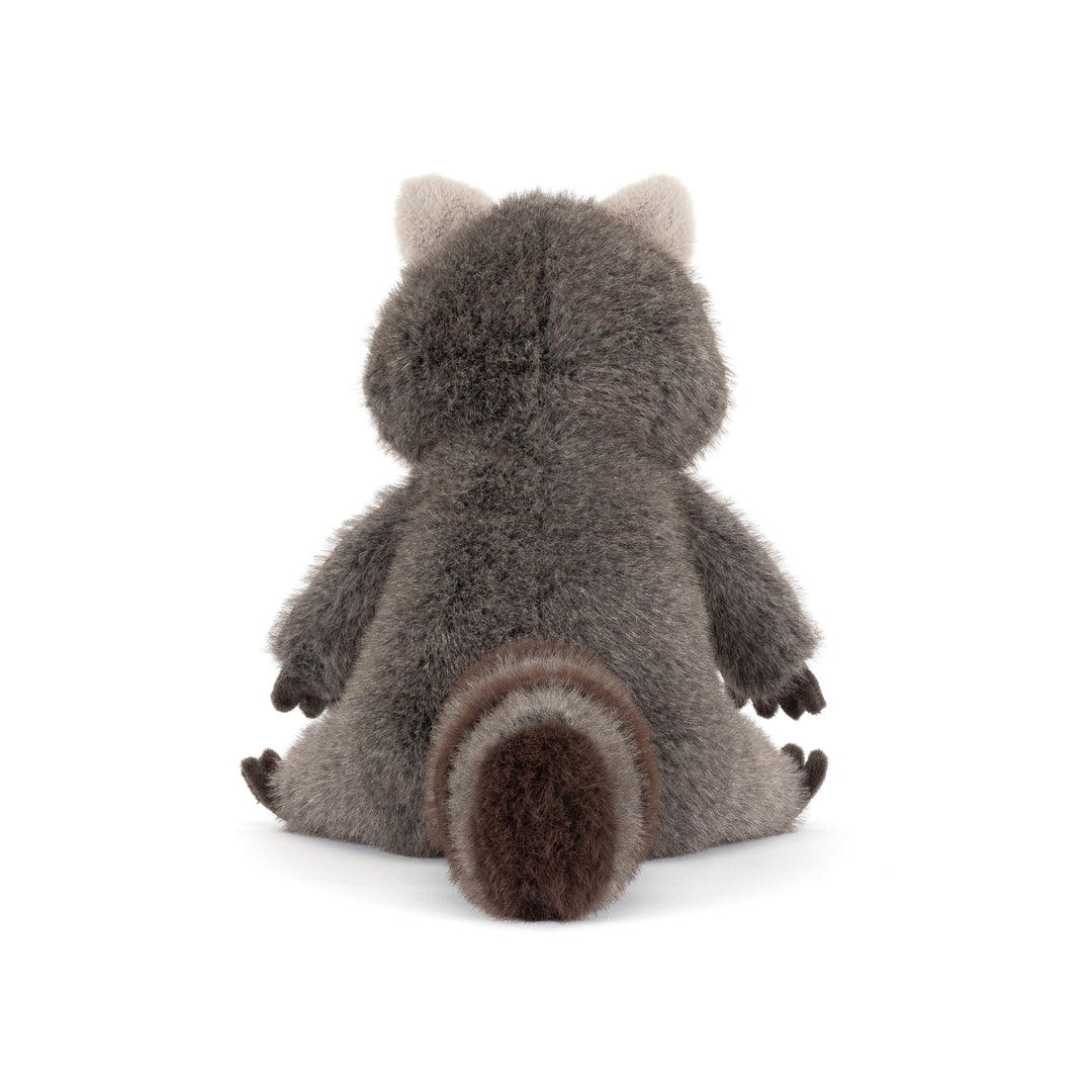 Trixiwoo Raccoon Jellycat plush with soft gray fur, fluffy striped tailand seated pose on a white background.