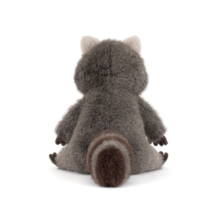 Trixiwoo Raccoon Jellycat plush with soft gray fur, fluffy striped tailand seated pose on a white background.