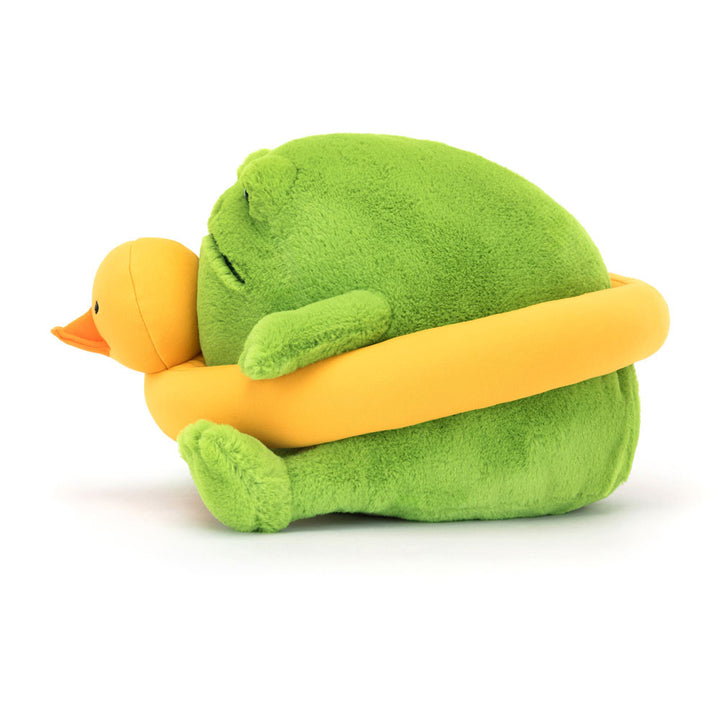 Ricky Rain Frog and his yellow ducky ring are an adorable combo. Profile view shows the orange bill of the yellow duck ring. The contrast of the yellow ring against his pea green fur really stands out. 