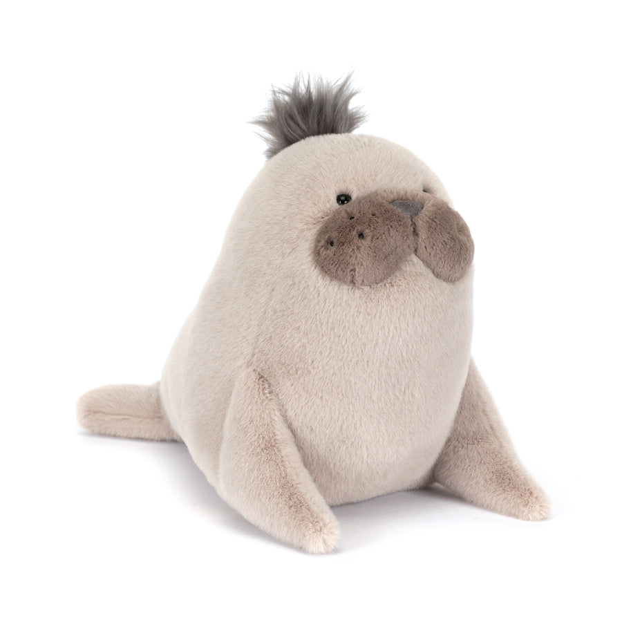 Plush toy sea lion on a white background