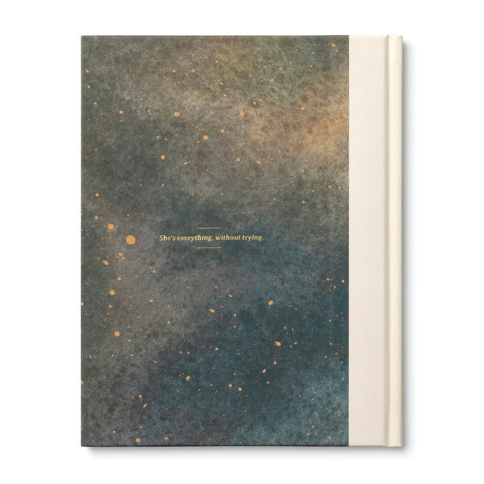 Back of book with textured cover and gold text on a white background