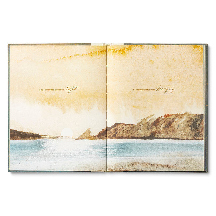 Open book with a scenic illustration of a coastal landscape on each page.