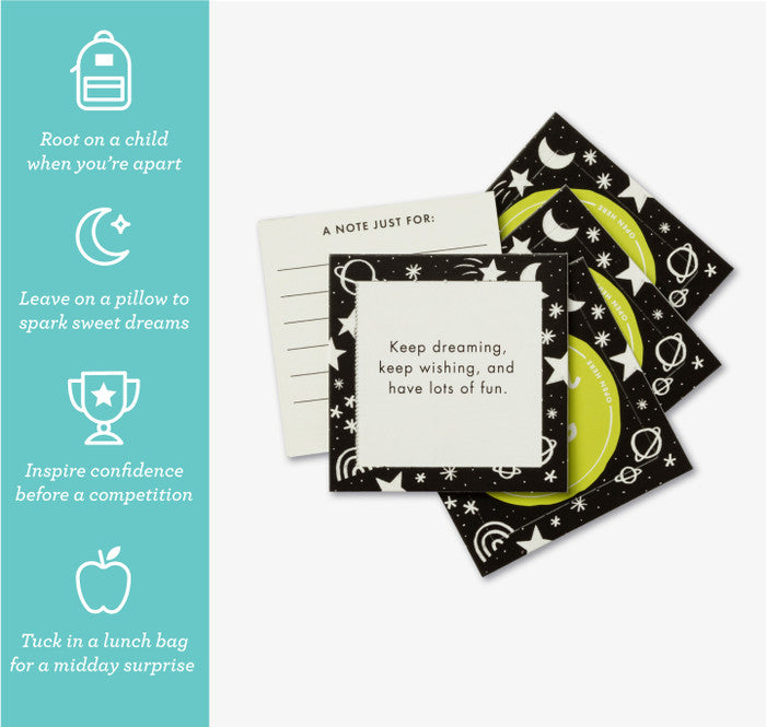 Note cards with space-themed designs on a white background