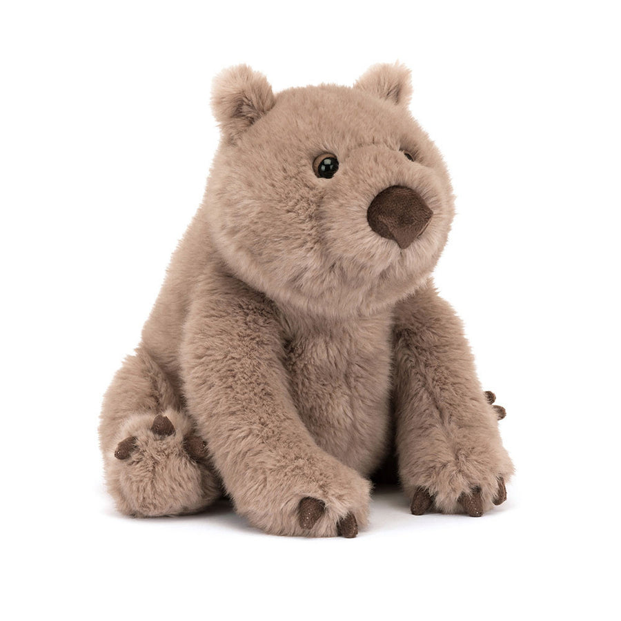 Jellycat Wonda Wombat plush with soft taupe-brown fur, rounded body, and gentle expression on a white background