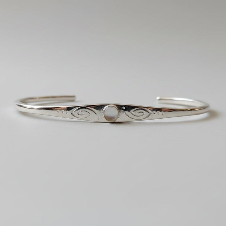sterling silver moonstone stamped cuff bracelet with swirl detail handmade jewelry