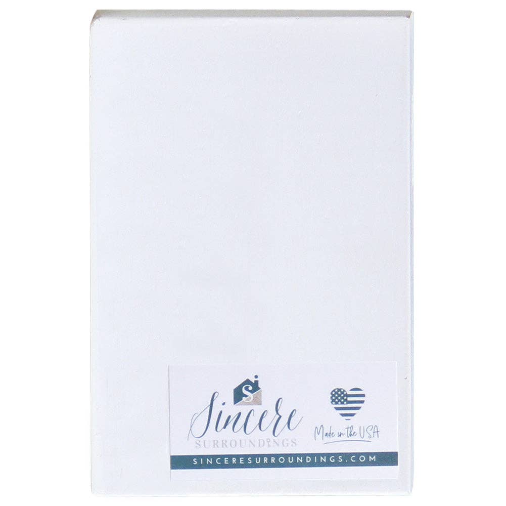 White block with 'Sincere Surroundings' branding on a white background