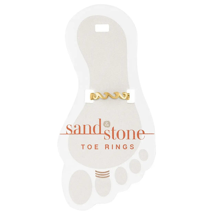 Gold infinity wave toe ring on display card
