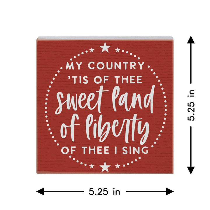 Red sign with white text and star designs, featuring a patriotic quote. Showing measurments
