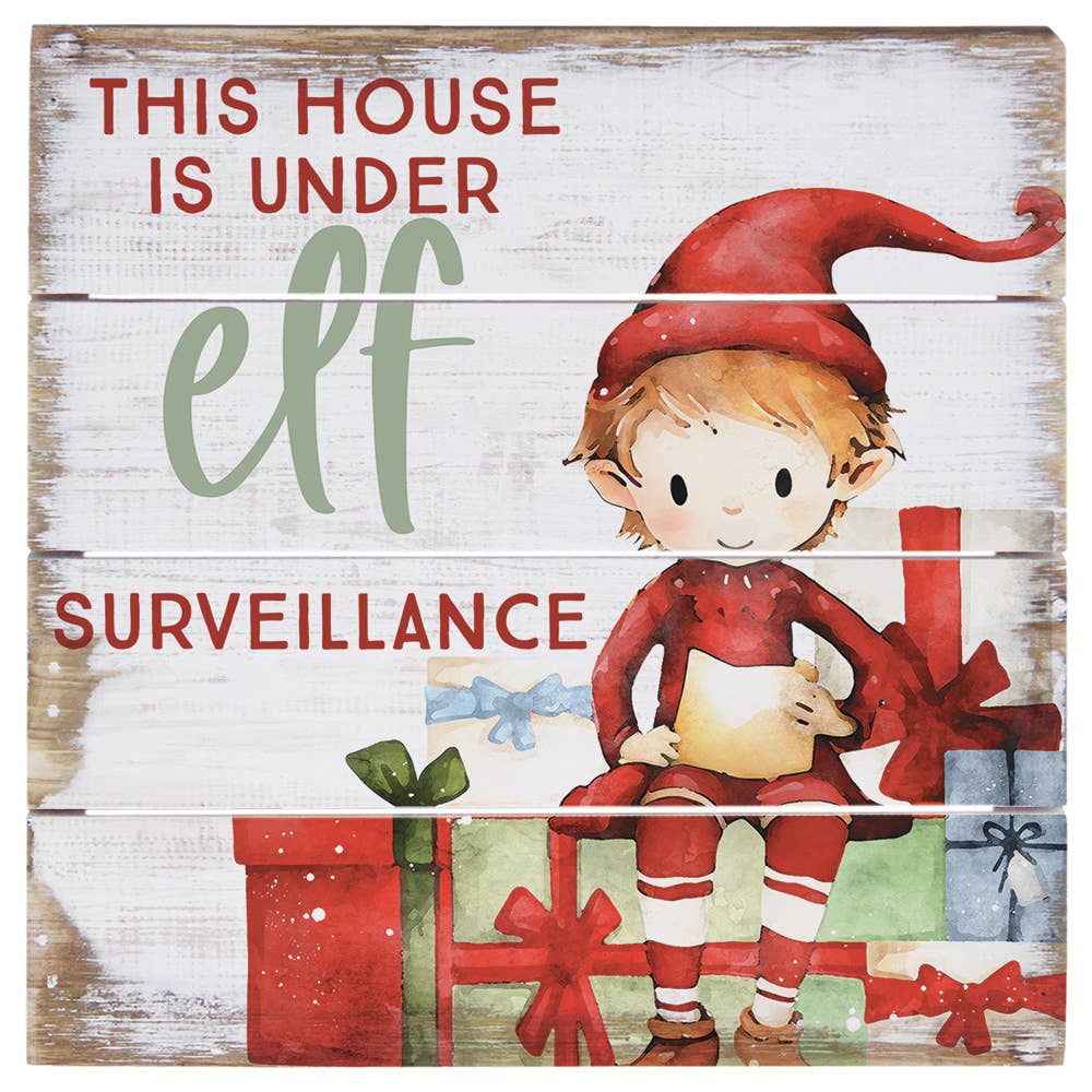 rustic cedar wood sign reading “This House Is Under Elf Surveillance” with watercolor elf and presents