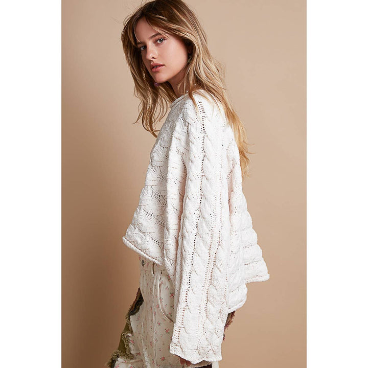 Round neck semi cropped knitted solid sweater